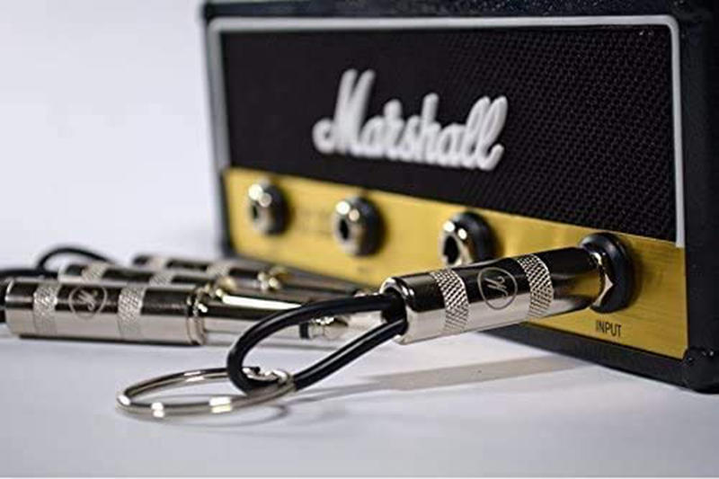 Shipping Free Marshall Jack Rackamp key hanger. Includes 4 guitar plug keychains and 1 wall