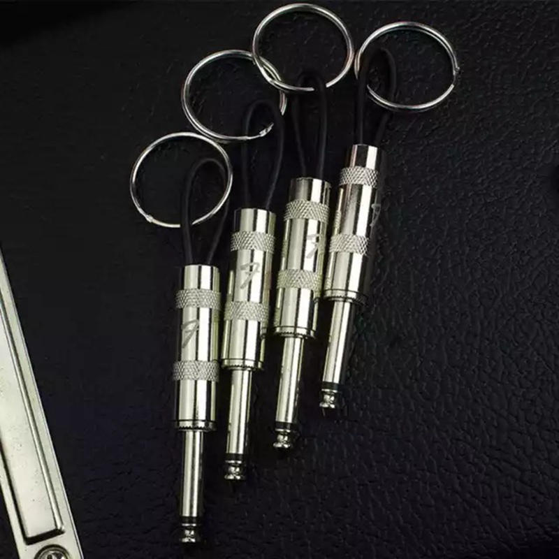 Shipping Free Fender Jack Rackamp key hanger. Includes 4 guitar plug keychains and 1 wall