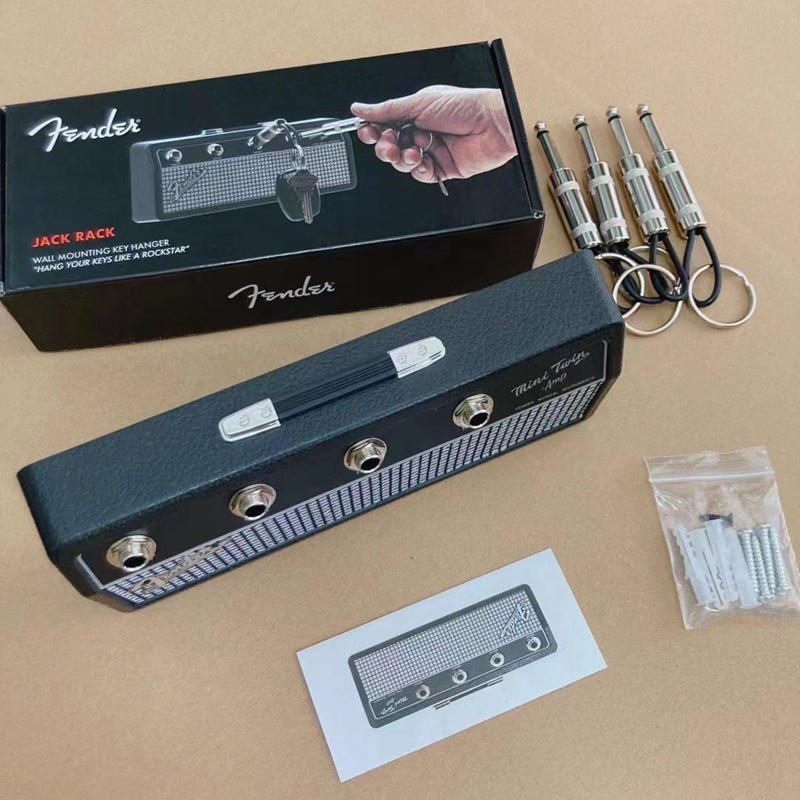 Shipping Free Fender Jack Rackamp key hanger. Includes 4 guitar plug keychains and 1 wall